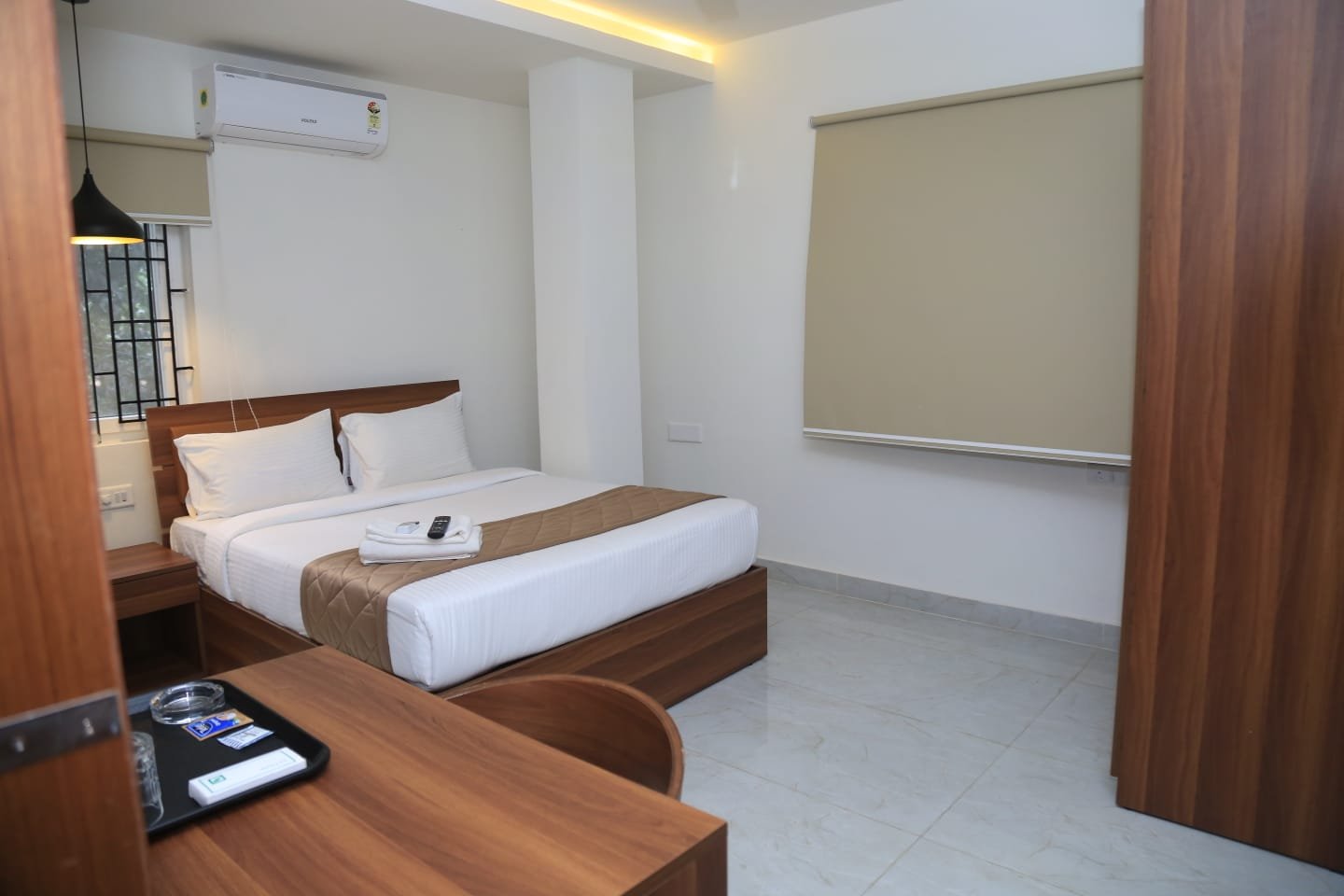 Luxury hotel room with king-sized bed and elegant interior